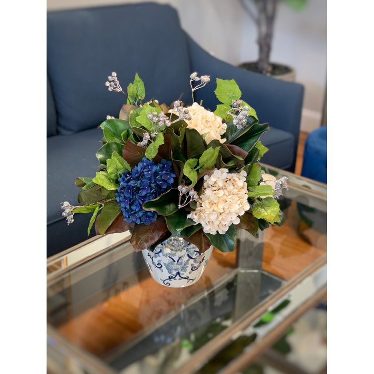 Assorted Hydrangea Magnolia and Berries in Vase